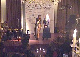 Ms. Acksteiner from "Deutsche Welle Radio & Television" is introducing  our "United 	World Philharmonic"-Concept